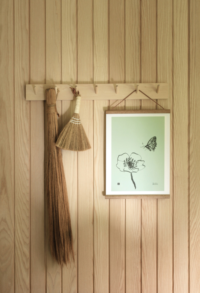 Spring green butterfly wall decor on a wooden frame