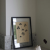 Clover mini art print on a black frame